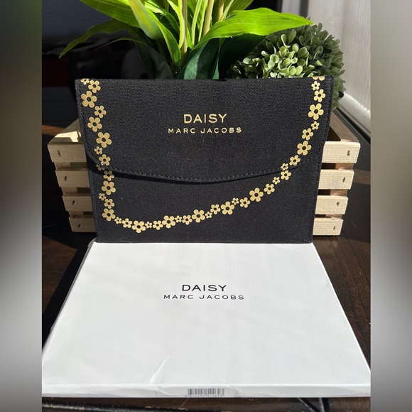 Marc Jacobs Handbags - Daisy by Marc Jacobs Black/Gold Pouch